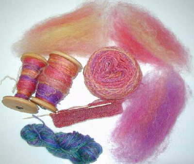 Sections of layered batts and yarns spun from layered batts